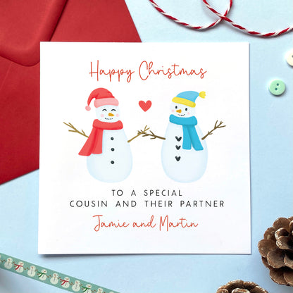 A personalised snowman couple Christmas card for Cousin and their Partner.