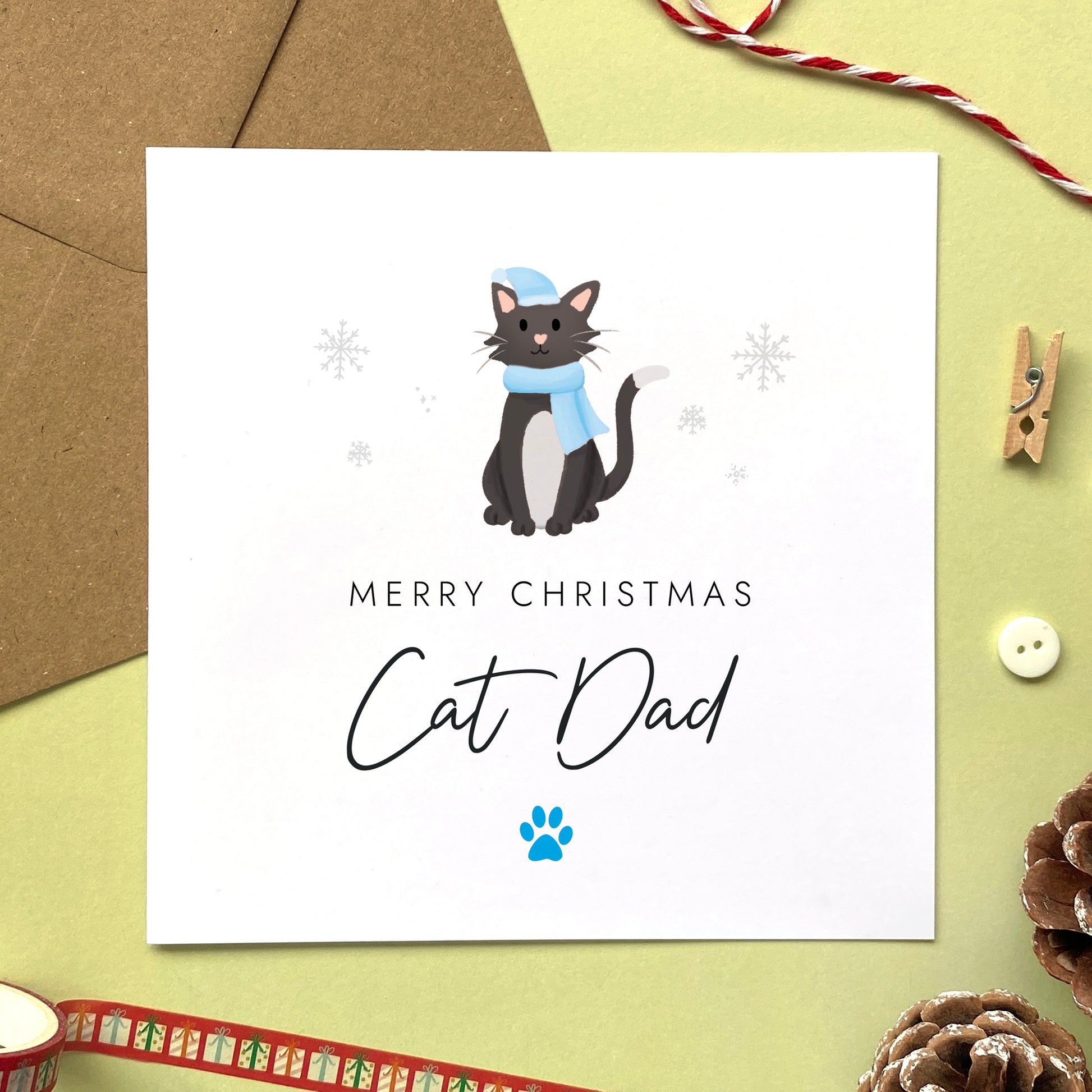 A personalised Christmas card for Cat Dad featuring a black and white tuxedo cat. It can be personalised by changing the relation and the cat. It's designed as a special Christmas card from the cat.