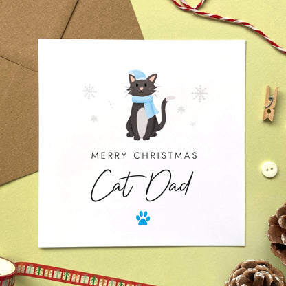 A personalised Christmas card for Cat Dad featuring a black and white tuxedo cat. It can be personalised by changing the relation and the cat. It's designed as a special Christmas card from the cat.