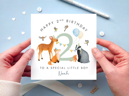Personalised Happy 2nd birthday card with woodland animals and 'Happy 2nd Birthday to a special little boy' text